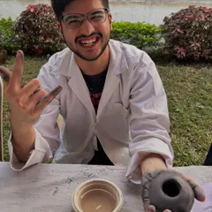 Even scientists need to get messy sometimes. A research scholar from the Tata Memorial Centre shows off his creation with a smile during our wellness workshop.