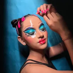 Pushing creative boundaries with this Pop Art inspired glass look. I teach techniques like eyebrow erasing and creating high-shine, reflective skin for TV and video photography.