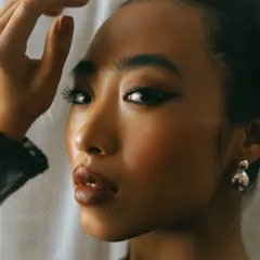 A warm, engaging beauty shot. The soft light and the model's gentle expression create a welcoming and approachable feel, perfect for commercial casting.