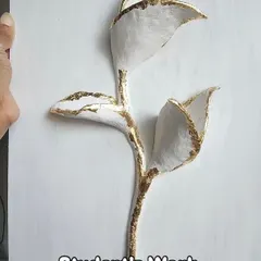 Here's a piece made by one of my students during the workshop. This is the exciting moment when we add the gold foil, bringing the sculpture to life with a touch of shimmer.