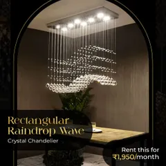 The Rectangular Raindrop Wave Crystal Chandelier is a popular rental choice for modern dining areas. Its unique wave-like crystal arrangement creates a beautiful play of light, adding a dynamic and elegant touch to your meals.
