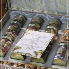 The unboxing experience of a Bhaji Box. I include a personalized menu card that details the handpicked selection of treats, adding a thoughtful and informative touch.