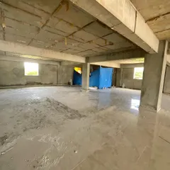 An initial walkthrough of the empty commercial floor. At this stage, I focus on the natural light sources, the structural elements, and the overall volume of the space to plan the customer flow and layout for the new home furnishing store.