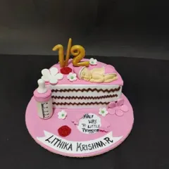 Celebrating the halfway mark to a first birthday! This "half cake" is a fun and popular way to celebrate your little princess turning six months old.