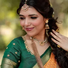 A close-up of our beautiful bride, Jothi. Her look features a custom-designed saree and a unique choker set from my collection, all brought together to create a timeless and elegant bridal style.