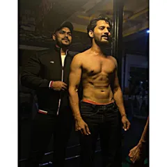 With a client after a tough session. You can see the definition and conditioning that comes from consistent hard work.
