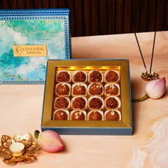 Our handcrafted chocolate truffles are a timeless indulgence. This assorted box, styled for Rakhi, shows how we blend fine couverture chocolate with classic flavors, creating a perfect alternative to traditional mithai for any festival.