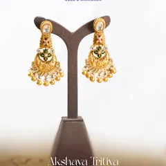 A blessing adorned, a promise preserved. These traditional earrings with meenakari and polki work are designed to let every new beginning dazzle and shine forever this Akshaya Tritiya.
