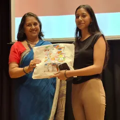 Another winner being honored on stage. We love to celebrate the achievements of our students in various competitions.