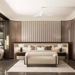 In this contemporary master bedroom for a Gurugram residence, we layered textures and materials to create depth. The space features veneer cladding, stitched leather panels, and custom lighting, all converging to form a sophisticated personal retreat.