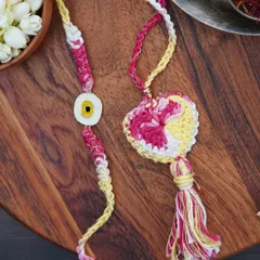 A combo set of a 'Bro' rakhi and a matching Lumba. Perfect for celebrating the bond with your brother and bhabhi.