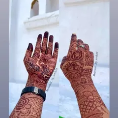 This is the beautiful, rich mahogany stain that develops after 48 hours. I make my own 100% organic henna paste, which guarantees a deep, long-lasting color that is completely safe for your skin.
