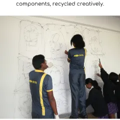Students collaborate on a large-scale wire sculpture, turning recycled materials into a work of art. This project teaches teamwork, creativity, and resourcefulness.