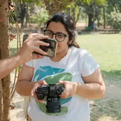 A fun behind-the-scenes moment where the photographer gets photographed. It shows the casual and collaborative nature of my shoots.