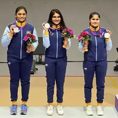 The Indian 10m Air Pistol Women's team, including our own Divya T.S., on the podium after securing the Silver Medal at the 19th Asian Games in China.