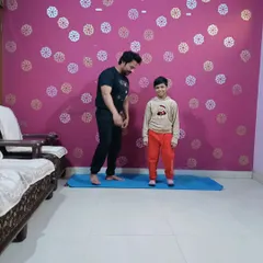 A proud coach moment after my young student successfully completed his yoga poses.