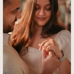 A close-up on the symbol of their promise. I focus on capturing the ring not just as jewelry, but as the centerpiece of this life-changing moment during their Rishikesh getaway.