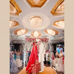 The pinnacle of the ceremony, the Varmala exchange, framed by grand decor and sparkling lights. We ensure these key wedding moments are captured with the cinematic flair they deserve.