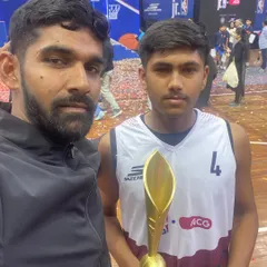 A selfie with one of my players after the Jr. NBA U-14 national finals. Seeing individual players grow and succeed on a national stage is what coaching is all about.