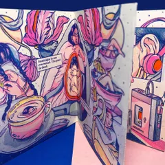 A detail shot of the inside of the Risograph zine, showing the beautiful layering of pink, blue, and yellow inks.