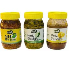 Here are three of my most loved pickles together: the classic Aam Mastana, the spicy Mirchi Chatkara, and the tangy Nimbu Chatpata. Each one is made in my kitchen with no chemicals or preservatives.
