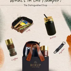 What's in the hamper? A look inside "The Distinguished Drop," which includes a leather tray, a glass bottle, premium coffee, and a keychain, all packed in a stylish gift bag.