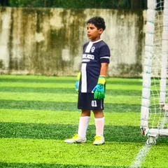 Our U11 goalkeeper, focused and ready between the posts during the Elite Grassroots Championships.
