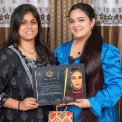 Another proud graduate from my academy. Each student receives a certificate of completion, validating their training in professional makeup and hairstyling.