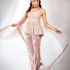 The delicate net dupatta adds a layer of elegance to this promotional look. I focus on every detail, from fabric to fit, to ensure my clients feel confident in front of the cameras.