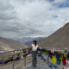 Standing amidst the prayer flags at a high mountain pass in Ladakh. Each flag sends a prayer on the wind, and being here feels like you are part of that collective offering of peace.