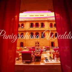 A vibrant Mehendi setup inside a Jaisalmer palace. The colorful seating and decor beautifully complement the traditional Rajasthani architecture, creating a stunning fusion of styles.