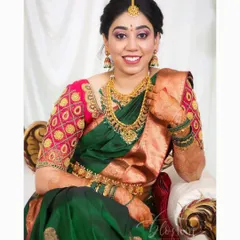 I love how this engagement photo turned out. The client's smile shows how comfortable and confident she feels in her perfectly draped saree, ready for her big event.