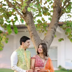 A candid shot of the couple sharing a smile. I focus on capturing these genuine interactions that show the true connection and friendship between two people.