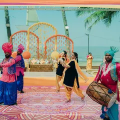 Energetic Bhangra and Gidda dancers at a Punjabi wedding event. I bring in authentic cultural performers to make your pre-wedding functions lively and traditional.