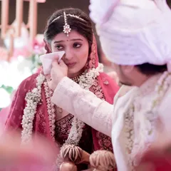 These are the moments that truly define a wedding. As the bride was overcome with emotion during the ceremony, the groom’s simple, tender gesture of wiping away her tear said everything. My focus is always on these quiet, powerful interactions that reveal the deep connection between two people.