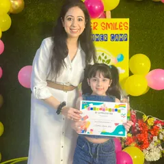 This little star is all smiles as she receives her summer camp completion certificate. It was a joy watching her confidence blossom throughout the camp.