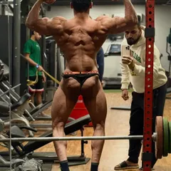 A look at the back double biceps pose. We work on every detail to ensure the back is wide, dense, and detailed.