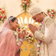 A beautiful ceremony moment. I styled the groom in an elegant ivory and gold Sulakshana Monga sherwani, which perfectly complements the bride's pink Rimple & Harpreet lehenga.