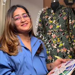 This is me in my element, working with color palettes and fabrics. As a trainer, consultant, and stylist, my goal is to empower you with the right tools for grooming and styling.