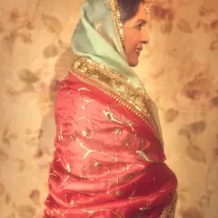The timeless Neena Gupta in a beautiful heritage look for 'Dastoor'. The combination of the mint green suit and the contrasting red and gold dupatta is a classic pairing.