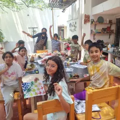 A happy and energetic group of kids during our "Discover your Creativity" workshop. The studio is filled with laughter and imagination during our summer camps.