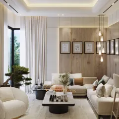 This bright and airy living room uses a neutral color palette and natural wood accents to create a calming atmosphere. The L-shaped sofa and plush armchair offer ample seating for family and guests.