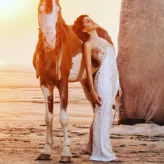 A truly magical shot with Alaya F and a horse at sunset. I chose this elegant white and gold gown to create a breathtaking, ethereal moment that feels like it's straight out of a fairytale.