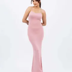 A front-facing shot of a model in a pink bodycon dress. The simple pose and even lighting provide a clear and accurate representation of the product for online shoppers.