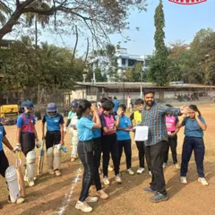 Our coaches briefing the aspiring players during the girls' team selection trials. Clear communication and encouragement are core to our process.