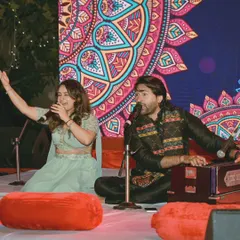 A live performance during a cultural event, capturing the singers fully engaged in their music. I work to frame performers against their stage backdrop to tell a complete story of the show.