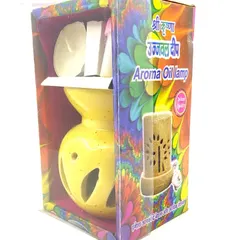 Another one of my aroma oil lamp sets, shown here in its colorful packaging. This yellow ceramic diffuser set also includes a tealight and aroma oil to get you started.