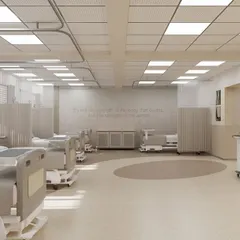 This view highlights the use of privacy screens and partitions between beds, offering patients dignity while still allowing for easy observation by staff. The neutral color palette and soft flooring contribute to a quieter, more restful atmosphere.