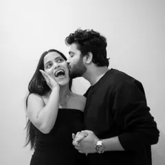 This is the color version of a wonderfully candid moment. The surprise and joy on her face are so genuine, and it makes for a portrait that is full of life and personality.