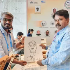 Drawing another distinguished guest at the NLC. My setup is compact and professional, fitting seamlessly into any conference or corporate environment.